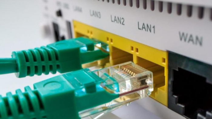 Ethernet cables connected to a routers LAN ports