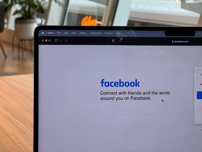 Facebook login page displayed on a laptop screen