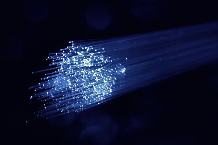 Fiber optic strands glowing with light