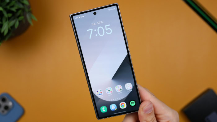 Foldable smartphone front screen in hand