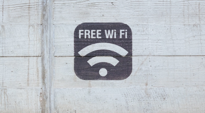 Sign of free wifi on wall