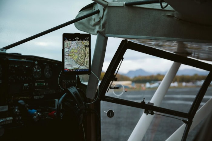 GPS navigation tablet mounted in small aircraft cockpit