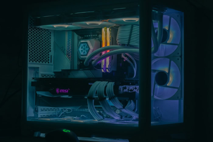Gaming PC interior with liquid cooling and RGB lighting