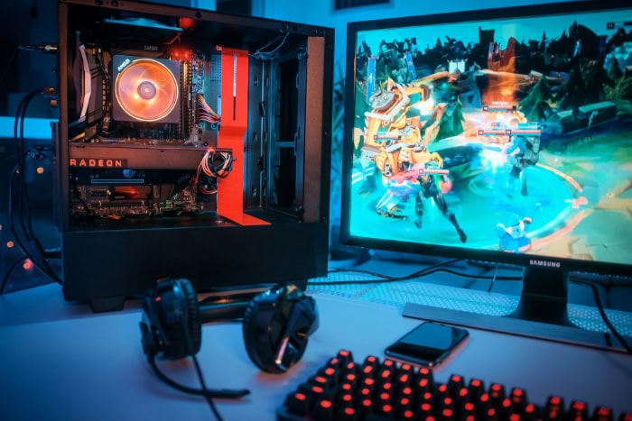 Gaming setup with Radeon GPU and vibrant game on screen