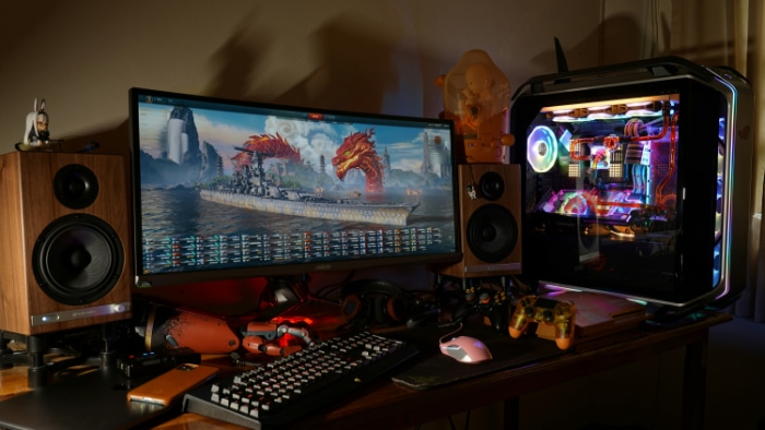 Gaming station with a wide monitor showcasing a game