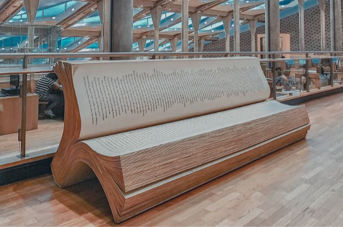 Giant book shaped bench in modern library