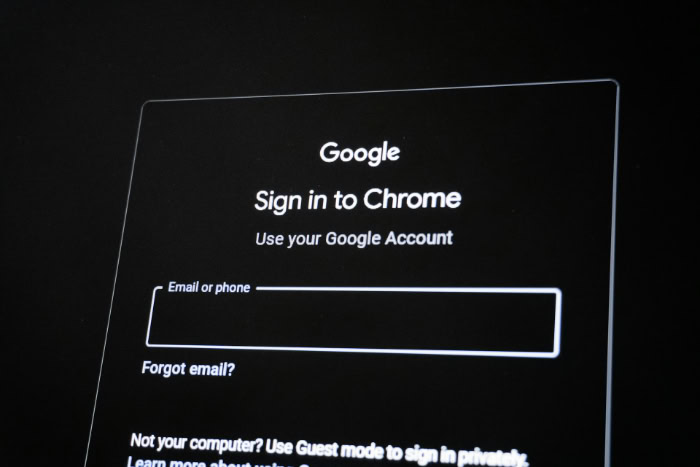 Google Chrome login screen on a dark display