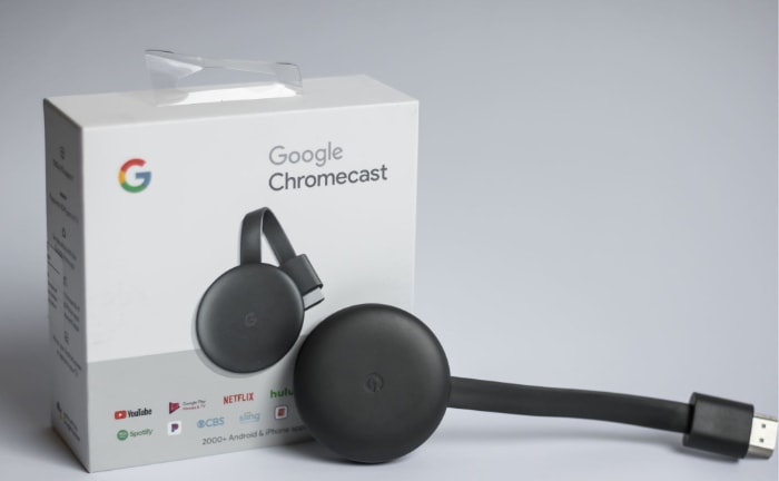 Google Chromecast and its packaging with the Google logo