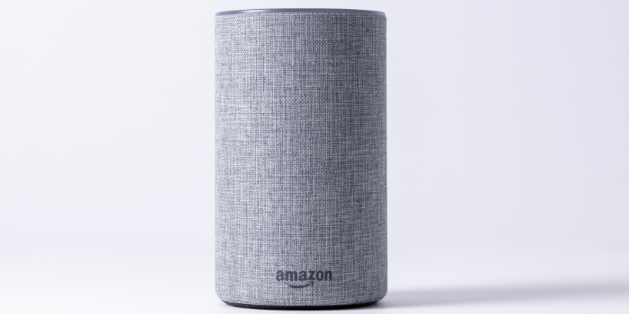 Heather gray Amazon Echo speaker on white background