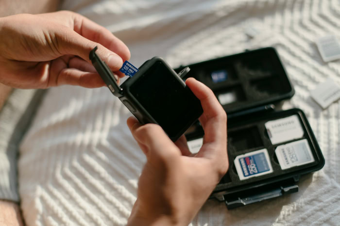 Inserting microSD card into GoPro action camera