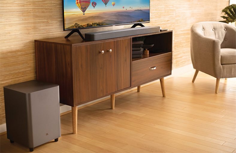 Black JBL Bar 5.1 on wooden table