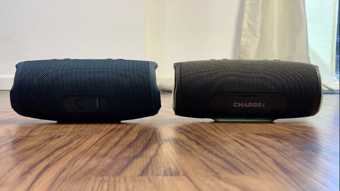 Back view of JBL Charge 4 and Charge 5 on wooden floors