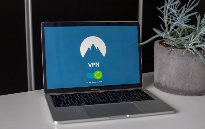 Laptop displaying VPN connection screen with mountain icon