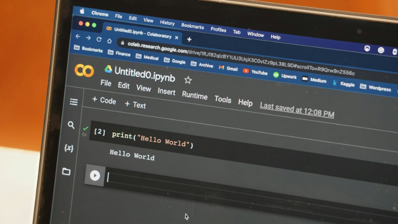 Laptop screen displaying Python code in Google Colab