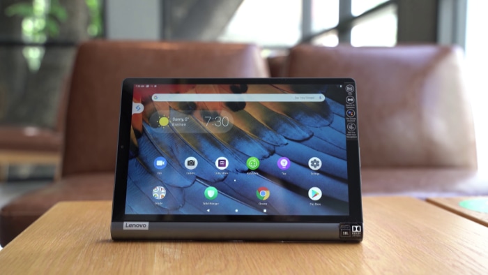 Gray Lenovo Yoga Smart Tab on wooden table