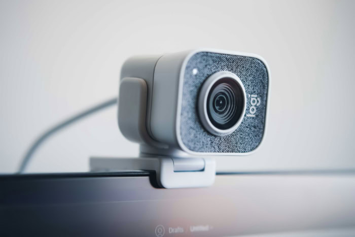 Logitech StreamCam webcam mounted on a computer monitor