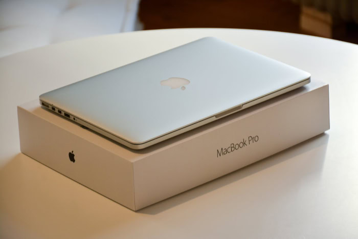 MacBook Pro resting on its original