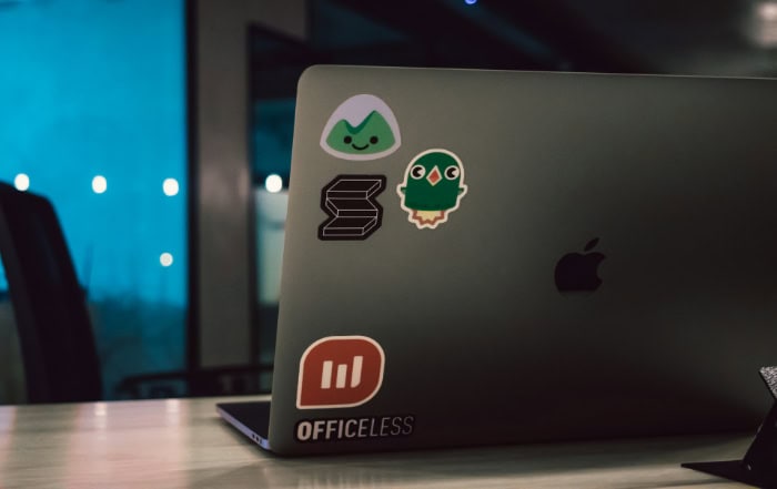 MacBook with minimalist stickers