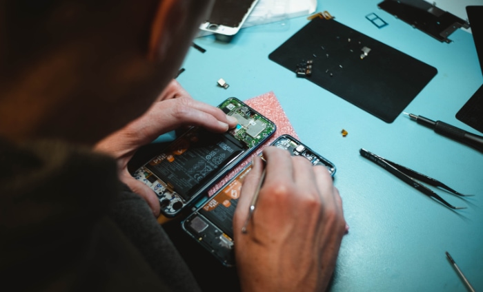 Man repairing iphone