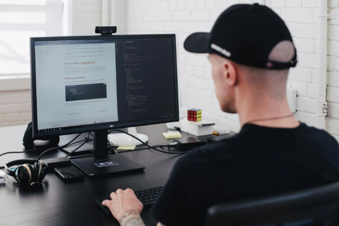 Man working at desktop computer in office