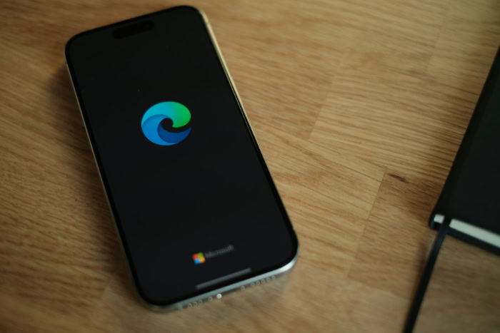 Microsoft Edge browser logo on smartphone screen