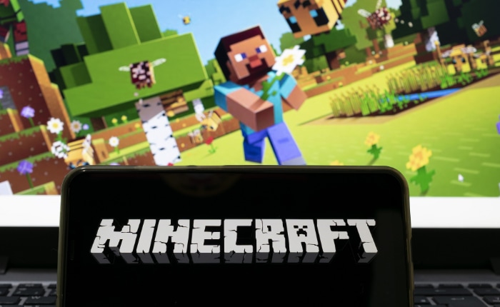 Minecraft on smartphone and laptop