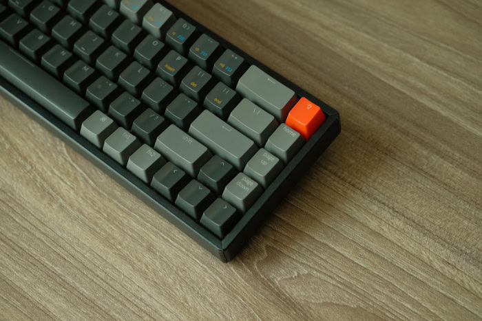 Minimalist mechanical keyboard with gray and orange keys