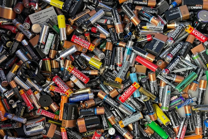 Mixed collection of used batteries from various brands and types