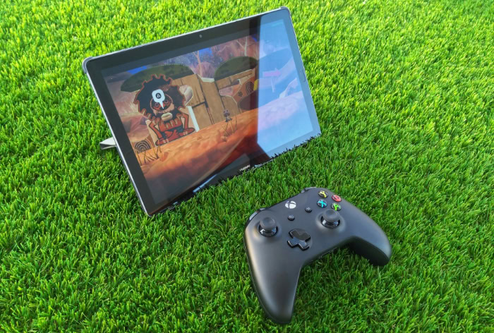 Mobile gaming setup with tablet and Xbox controller