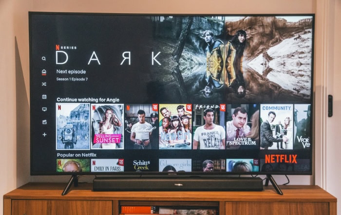Netflix interface on TV showing Dark series and recommended shows