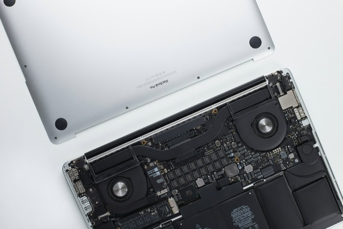 Open MacBook Pro revealing internal hardware components