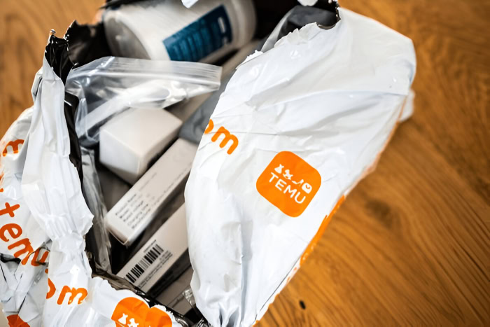 Open Temu package showing shipped online order items