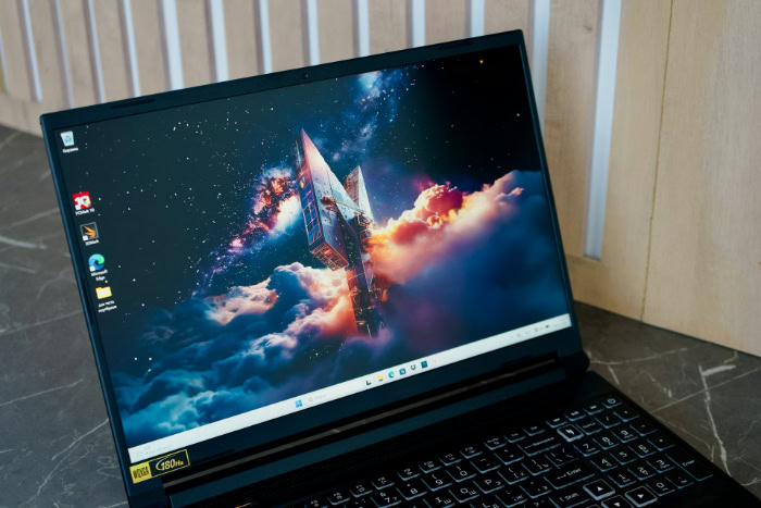 Open gaming laptop showing screen display and keyboard