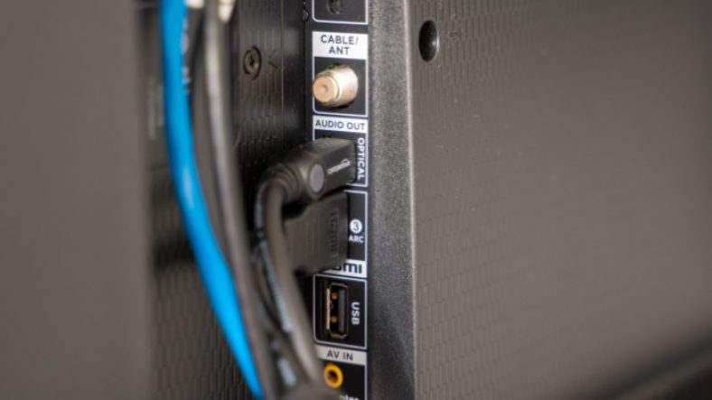Rear view of a TV showing optical port connection