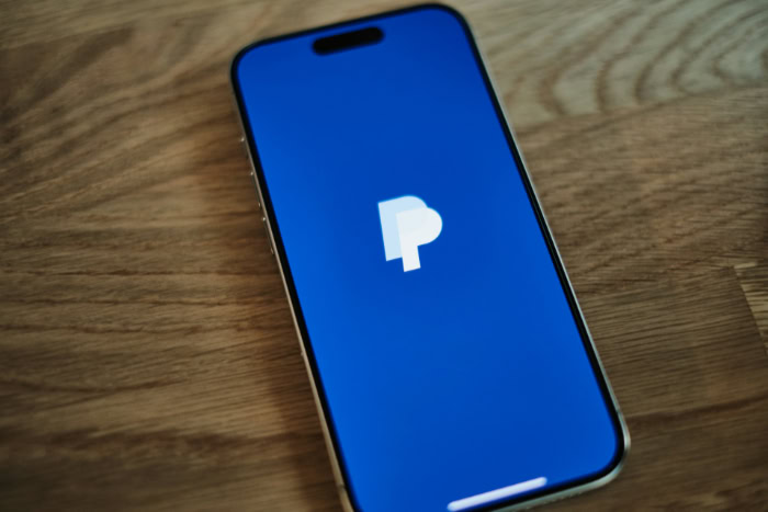 PayPal logo displayed on a smartphone screen