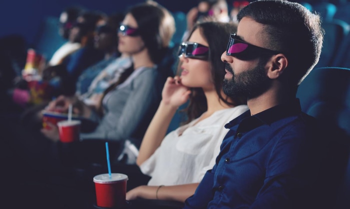 People watching movie in 3d glasses
