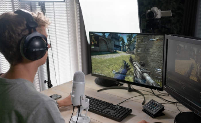 Person gaming on computer 1