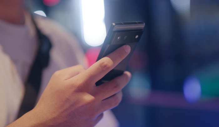 Person holding black android phone