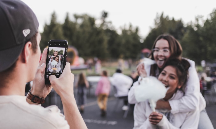 Person taking picture of friends