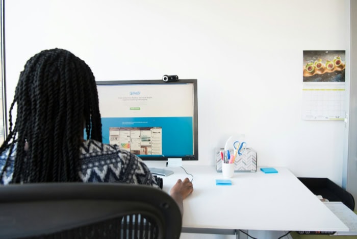 Person using Trello on desktop computer