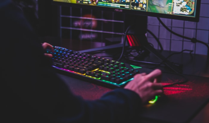 Person using gaming keyboard