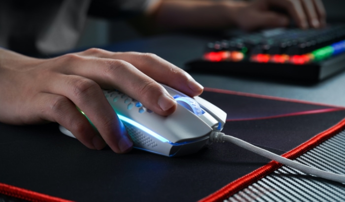 Person using mouse on mouse pad