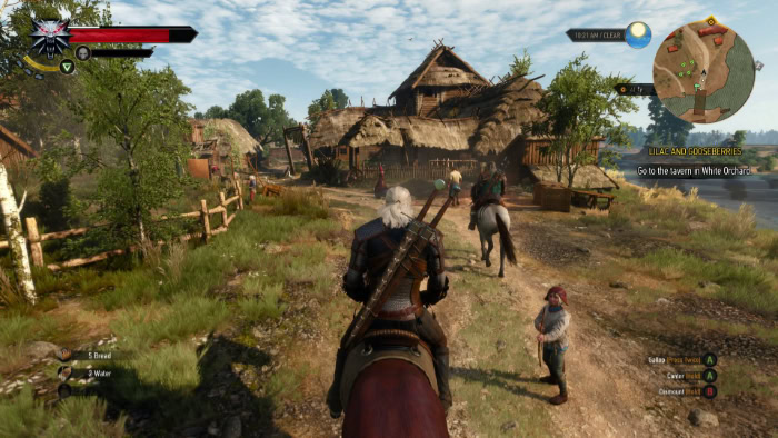 Player exploring a village in an open world RPG
