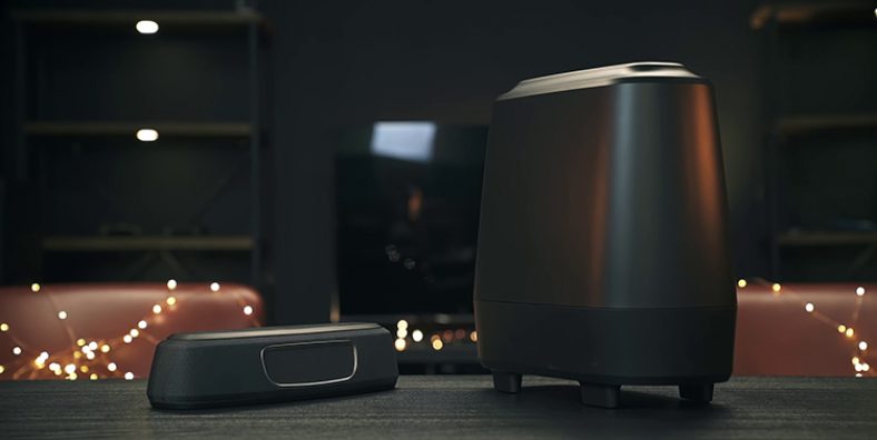 Black Polk Audio MagniFi Mini on black table