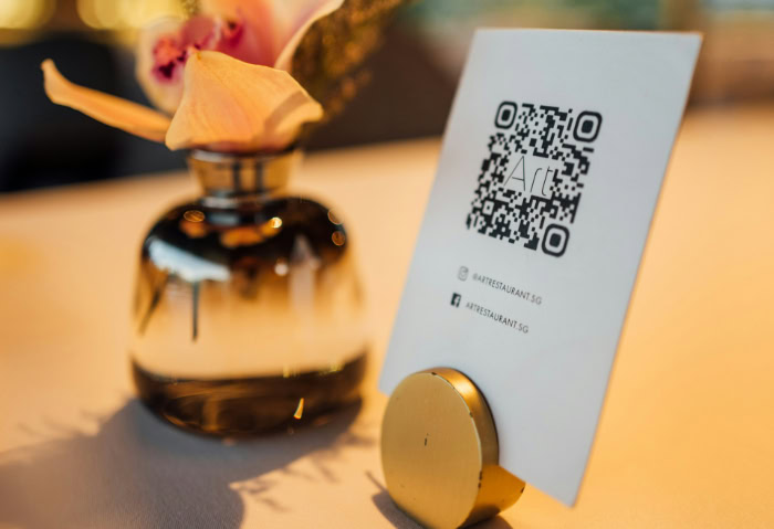 QR code menu stand on restaurant dining table