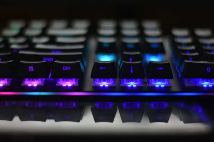 RGB keyboard with purple and blue LED lighting
