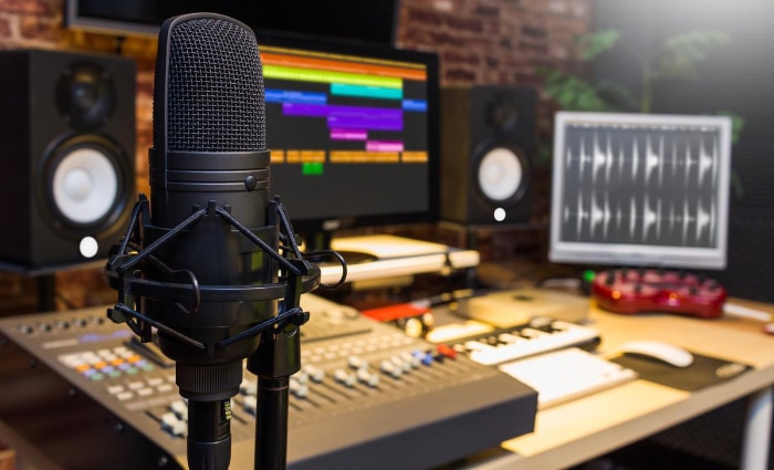 Recording studio setup featuring a condenser microphone