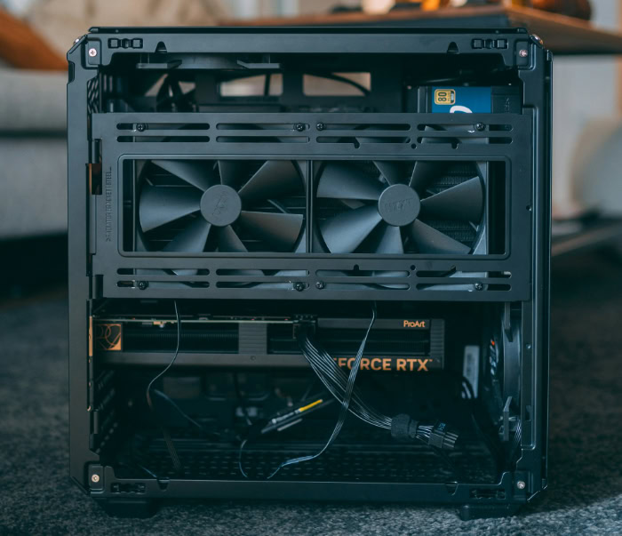 SFF PC interior showing dual NZXT cooling fans