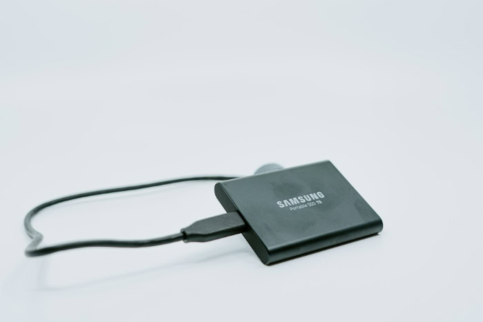 Samsung Portable SSD T5 with connected USB cable