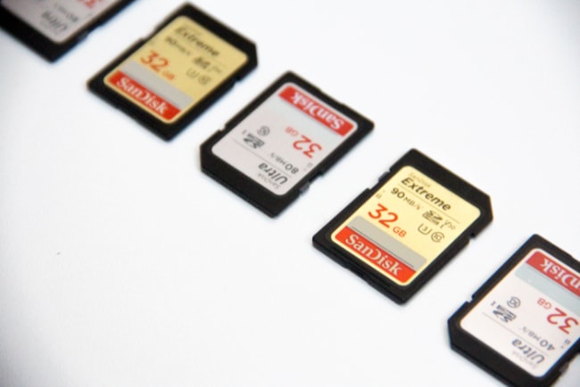 Several SanDisk memory cards laid out